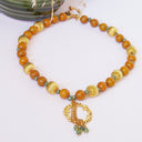 collier "Carnet de Voyage"