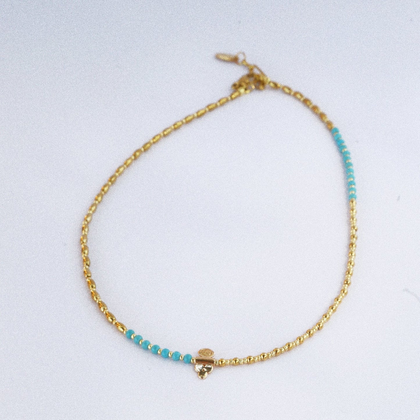 Collier “Code 27” – Perles Bleu Turquoise & Œil de Protection