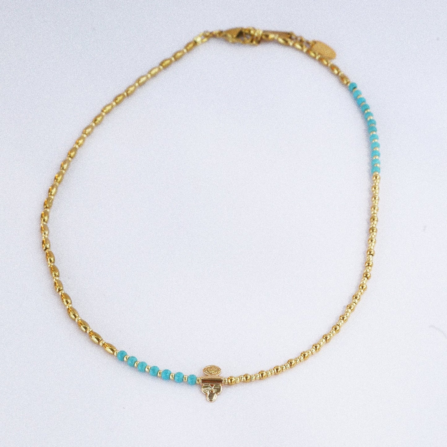 Collier “Code 27” – Perles Bleu Turquoise & Œil de Protection