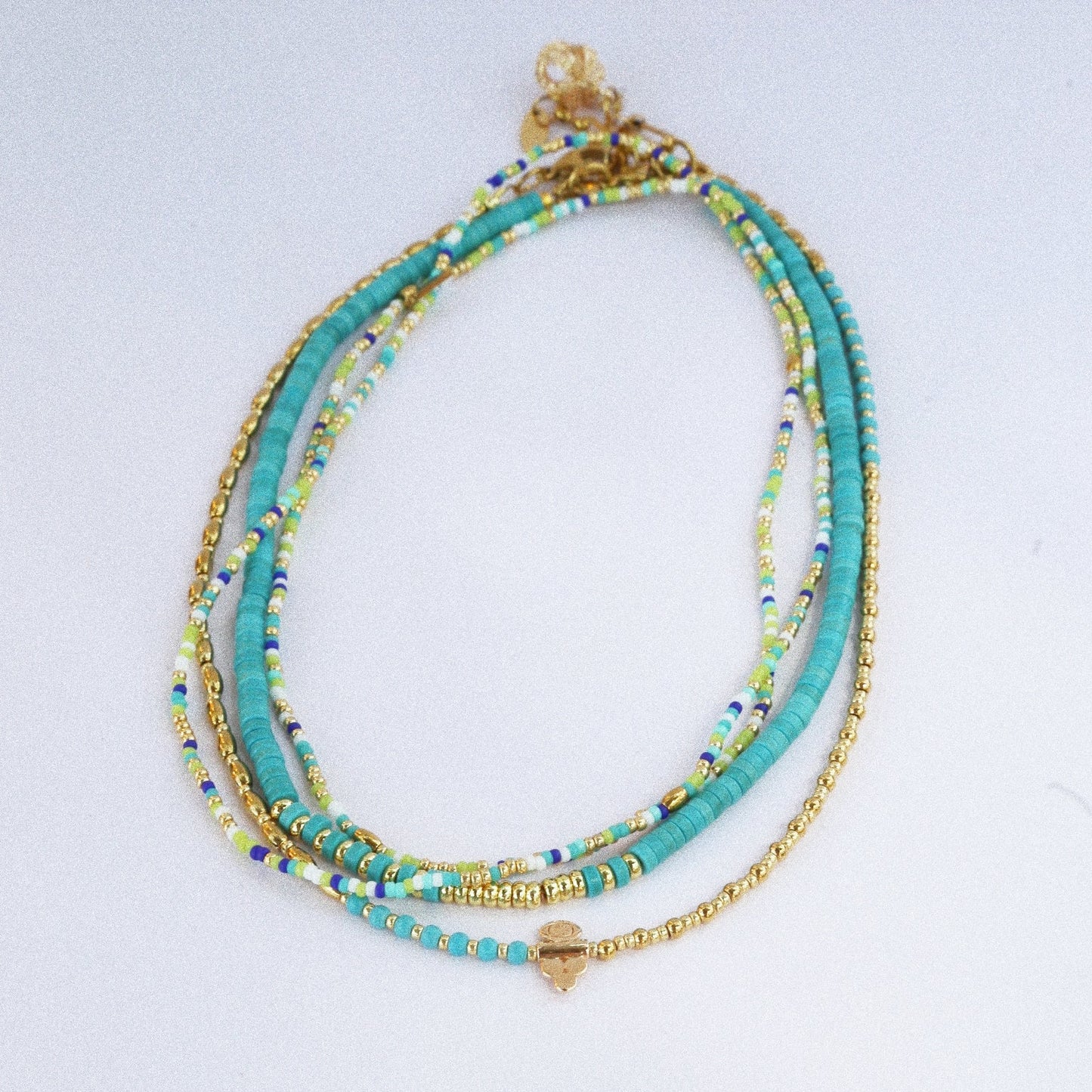 Collier “Code 27” – Perles Bleu Turquoise & Œil de Protection