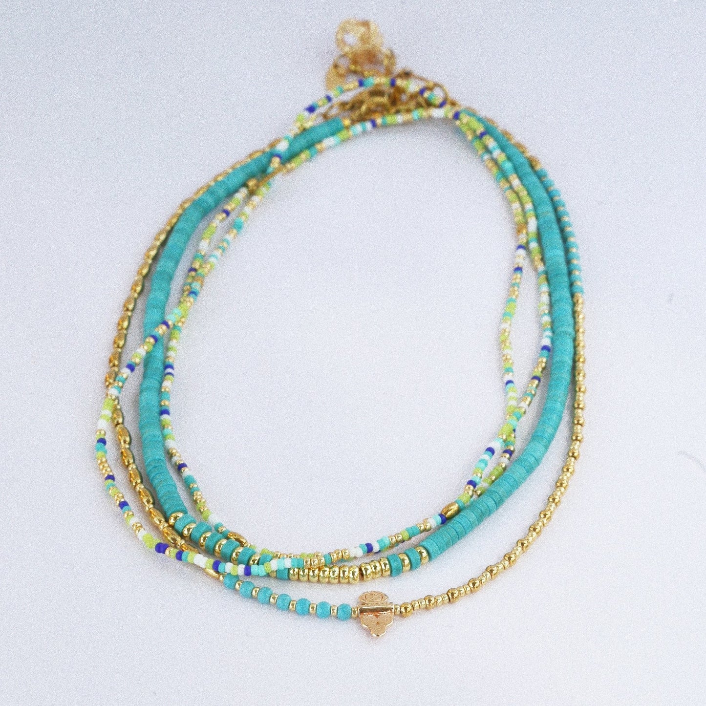Collier “Code 27” – Perles Bleu Turquoise & Œil de Protection
