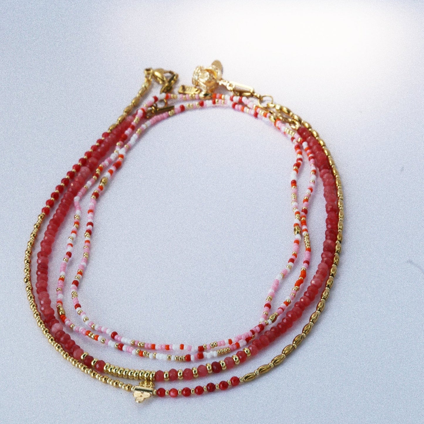 Collier “Code 27” – Nacre Rouge & Œil de Protection