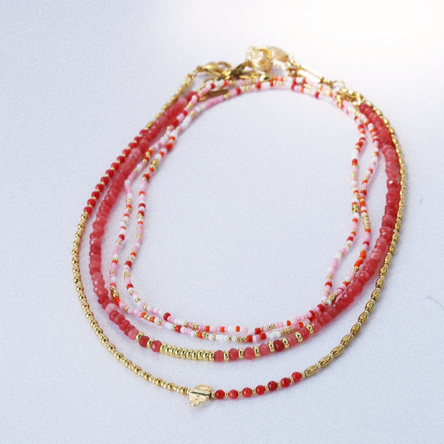 Collier “Code 27” – Nacre Rouge & Œil de Protection