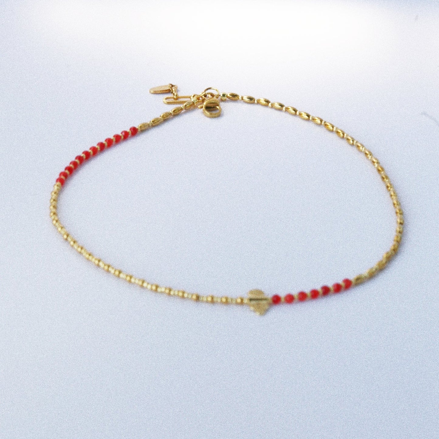 Collier “Code 27” – Nacre Rouge & Œil de Protection