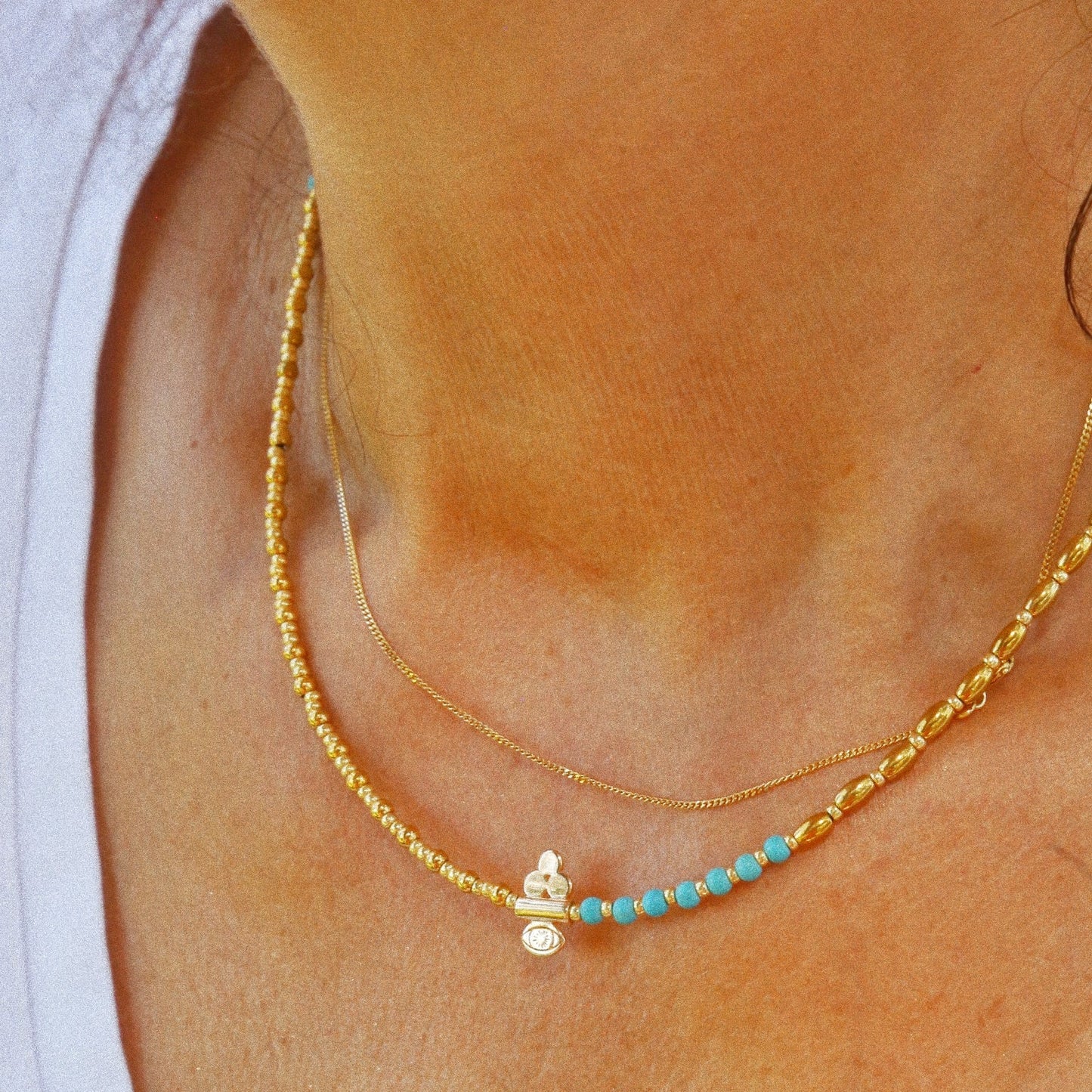 Collier “Code 27” – Perles Bleu Turquoise & Œil de Protection